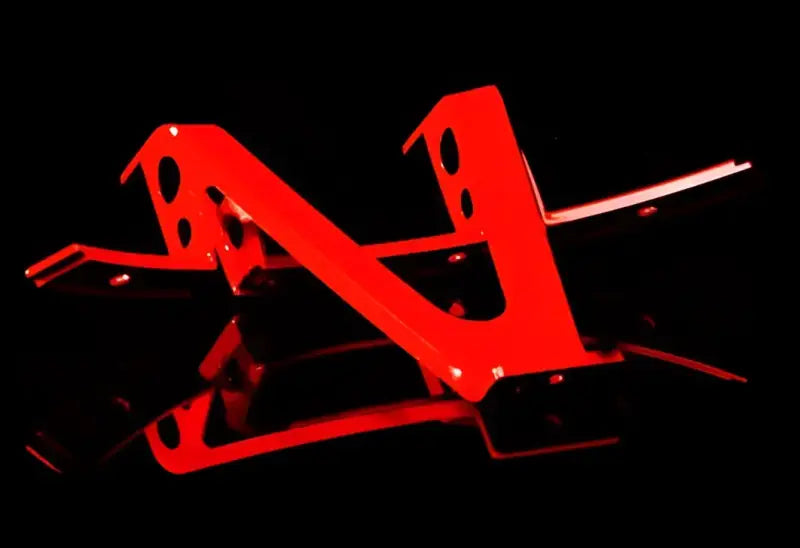 Red metal bracket with mounting holes for split spoke inserts on Wheel Pros Split Spoke 22X10 wheel