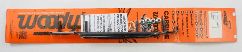 Slim Jim Dooly snowmobile track stud kit with carbide studs on bright orange card