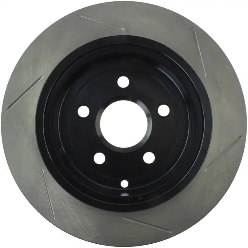 StopTech Power Slot rear right slotted brake rotor for 08-09 Pontiac G8 with black silver grooves