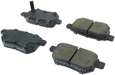 StopTech Street Brake Pads front set with black rubber metal components