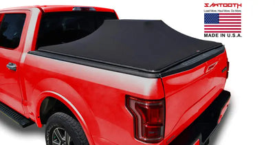 Red F-150 Raptor pickup with black tonneau cover TF1135-01 Sawtooth for 15-20 F-150 Raptor
