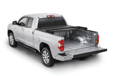 2019 Toyota Tundra with Tonno Pro tonneau cover, black bed cover, and silver accents