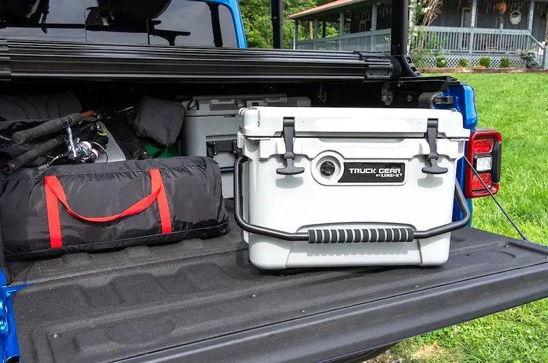 White truck gear cooler20 20 Qt cooler with black handle and latches for adventures