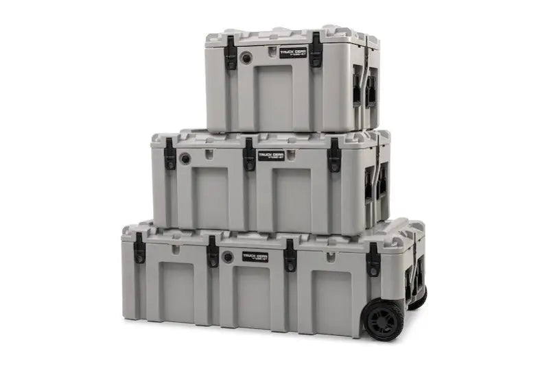 Stack of three light gray Truck Gear STRCS130 TGR Expedition Storage Cases with wheels