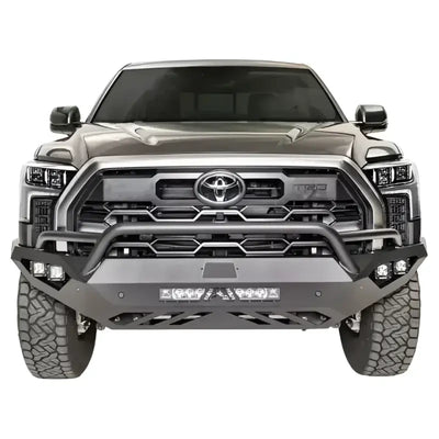 Front view of a truck equipped with the TT22-D5452-1 Fab Fours Vengeance Bumper, showcasing its robust construction and sleek design, RV, Automotive, Powersports, off-road, marine, exterior, truck accessories, interior, truck bed, rv parts, Bumpers, Grilles & Guards, AVADA - Best Sellers, Must Haves