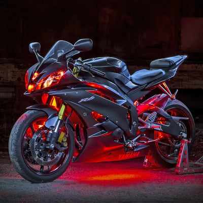 Black Yamaha R6 motorcycle lit up with red lights from XK Glow LED strip kit